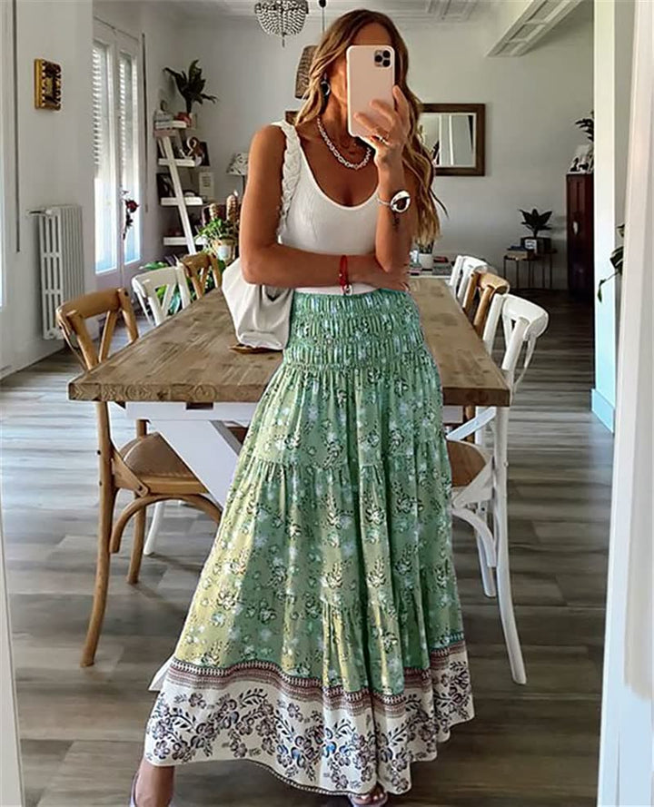 Patterned bohemian tiered midi skirt for women, a stylish flowy design perfect for warm weather & summer fashion.