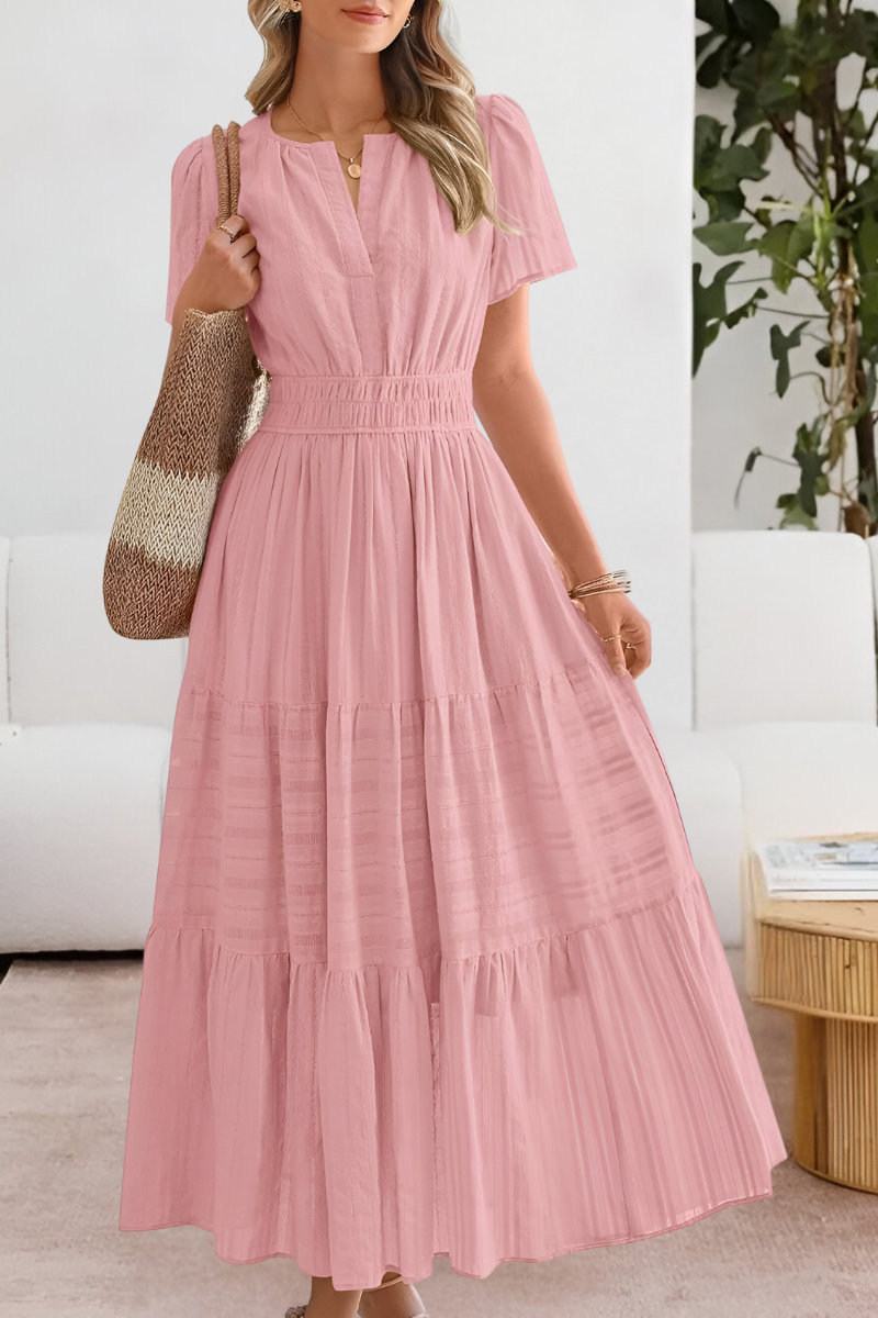 Model wearing a Women's Boho Breeze midi summer dress, showcasing its flowy silhouette and casual elegance.
