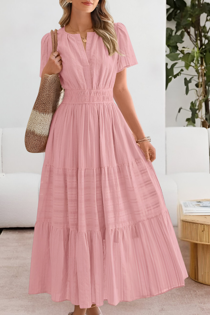 Model wearing a Women's Boho Breeze midi summer dress, showcasing its flowy silhouette and casual elegance.