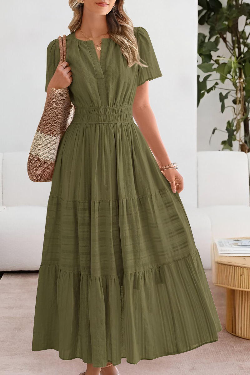 Back view of a Women's Boho Breeze midi summer dress, highlighting its comfortable fit and vacation style.