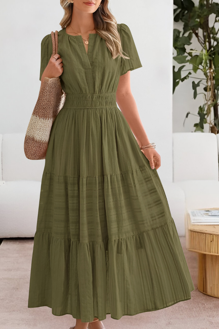 Back view of a Women's Boho Breeze midi summer dress, highlighting its comfortable fit and vacation style.