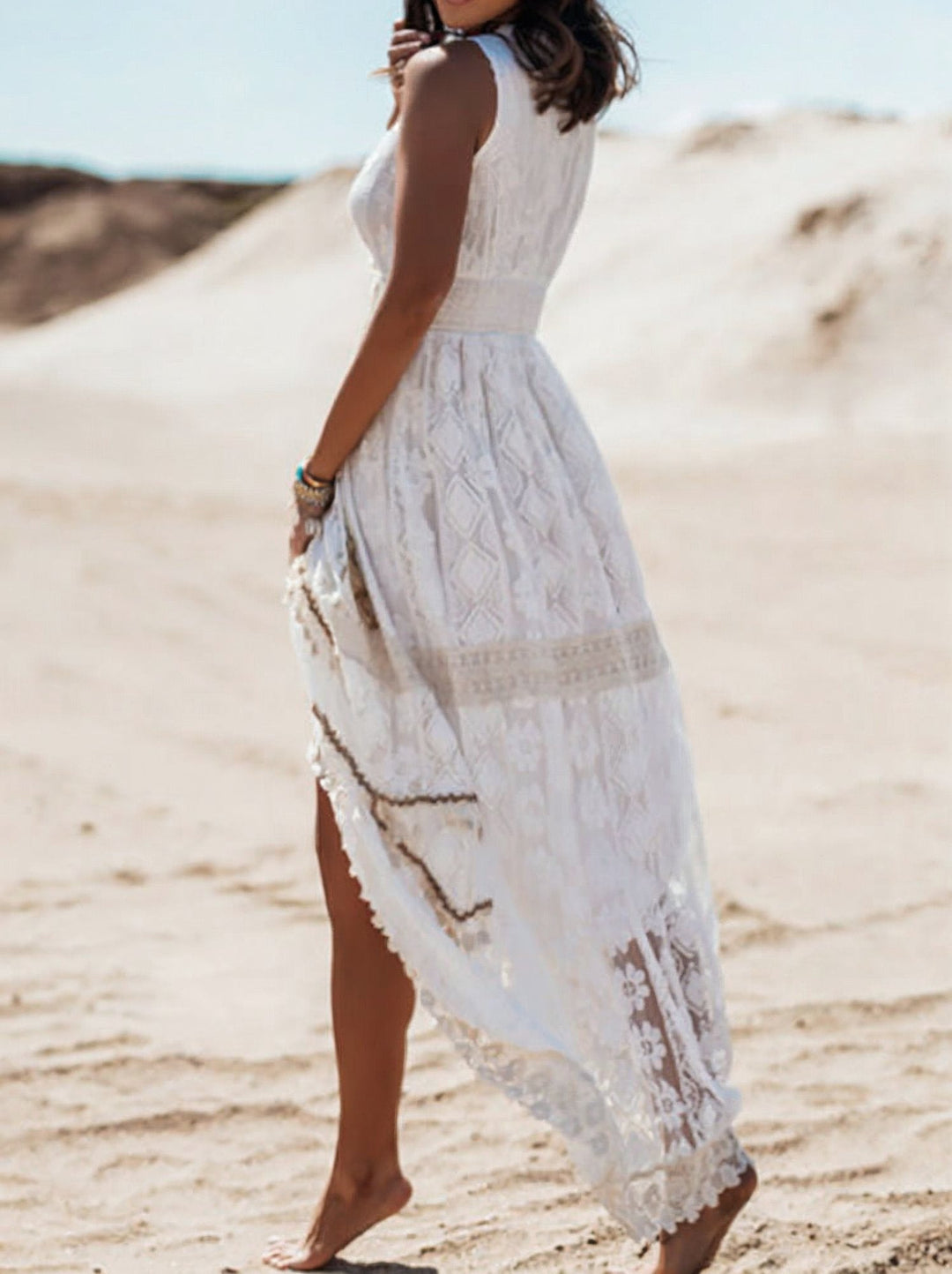 Stylish women's elegant boho maxi dress with a V-neck and lace trim, perfect for summer vacation fashion.