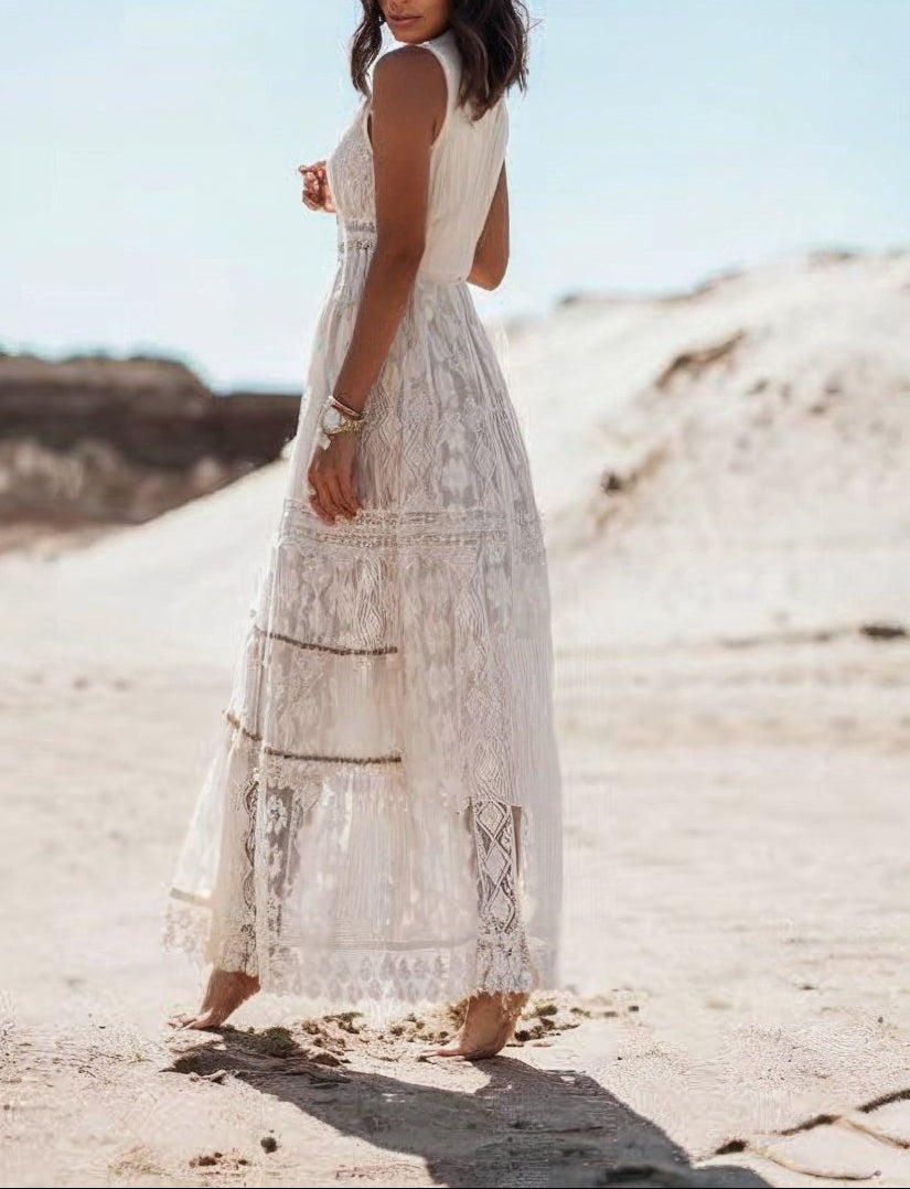 Flowy women's summer lace maxi dress with a V-neck, excellent for casual wear or as an elegant beach dress.