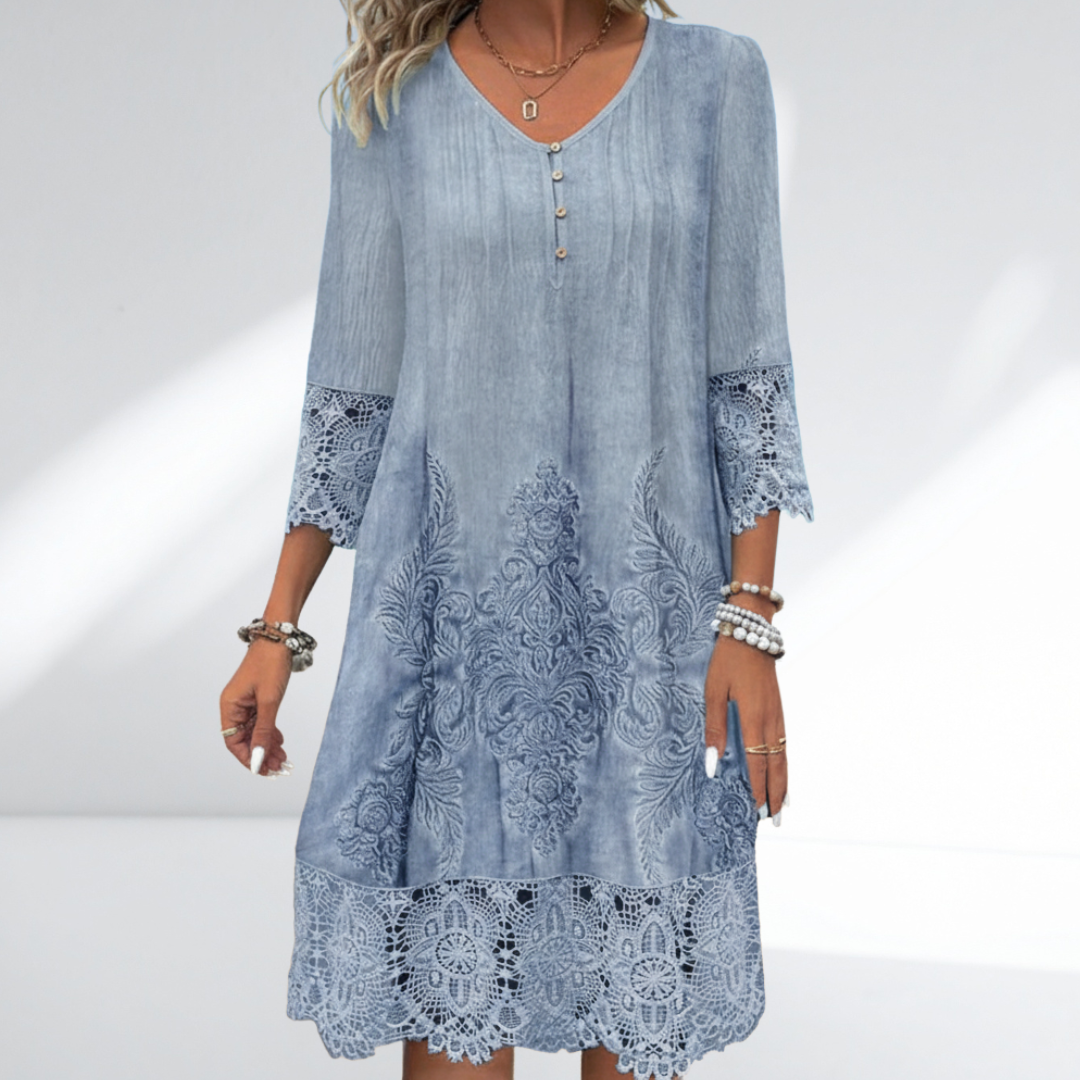 Bohemian women's A-line midi dress featuring a V-neck, elegant lace trim, and intricate embroidered 3/4 sleeves.