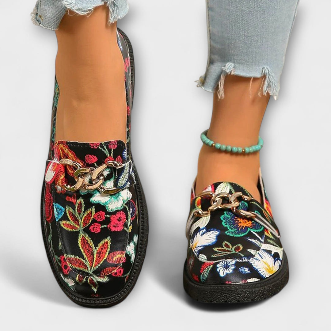 Fashionable women's multicolor loafers, durable footwear featuring a colorful, eye-catching design.