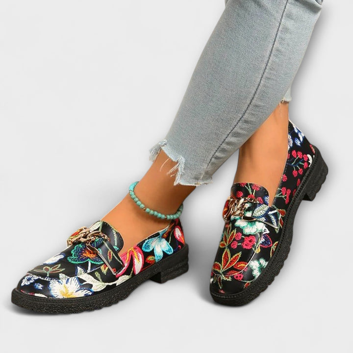 Pair of women's vibrant slip-on loafers, multicolor casual shoes for comfort and style.