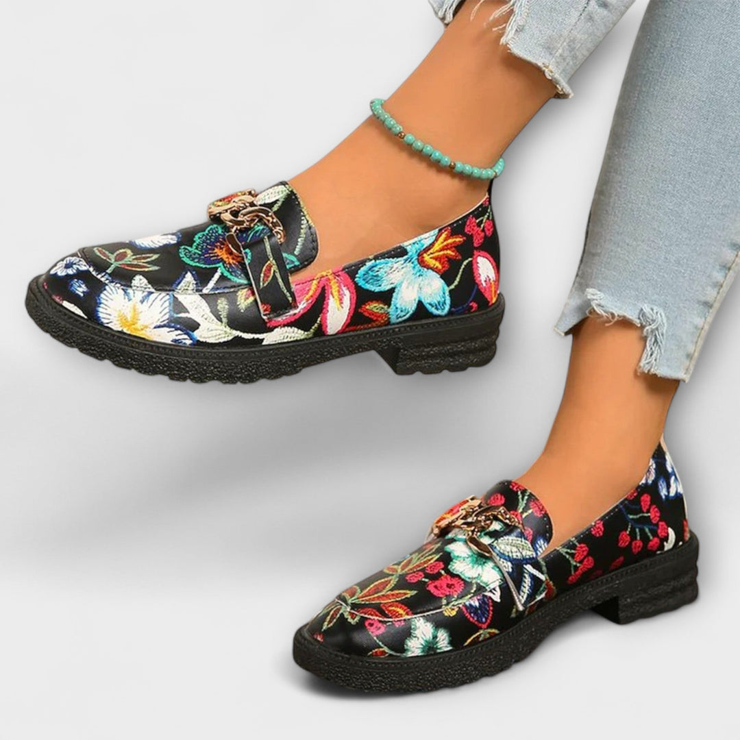 Close-up of women's multicolor loafers, showcasing the bold pattern and quality construction.