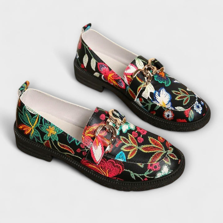 Stylish women's loafers in a vibrant multicolor pattern, perfect durable casual shoes for fashion.