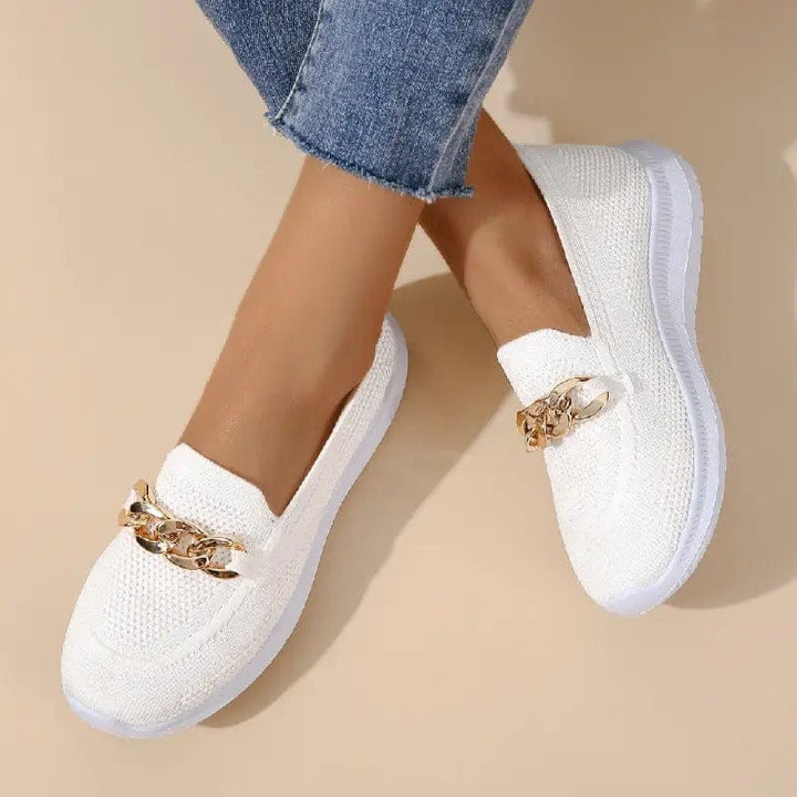 Front view of women's casual shoes featuring breathable mesh and a comfortable design