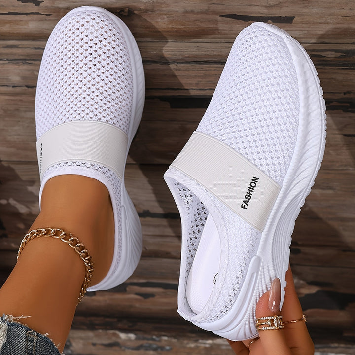 Women's breathable mesh slip-on summer sneakers, perfect for casual walking & travel.