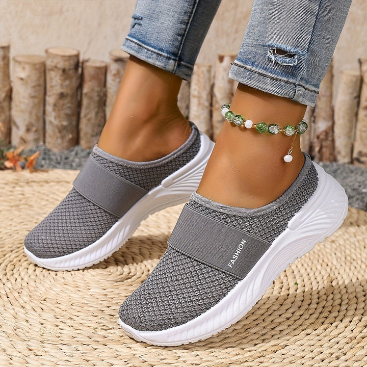 Women's casual summer slip-on sneakers with breathable mesh, lightweight & stylish.