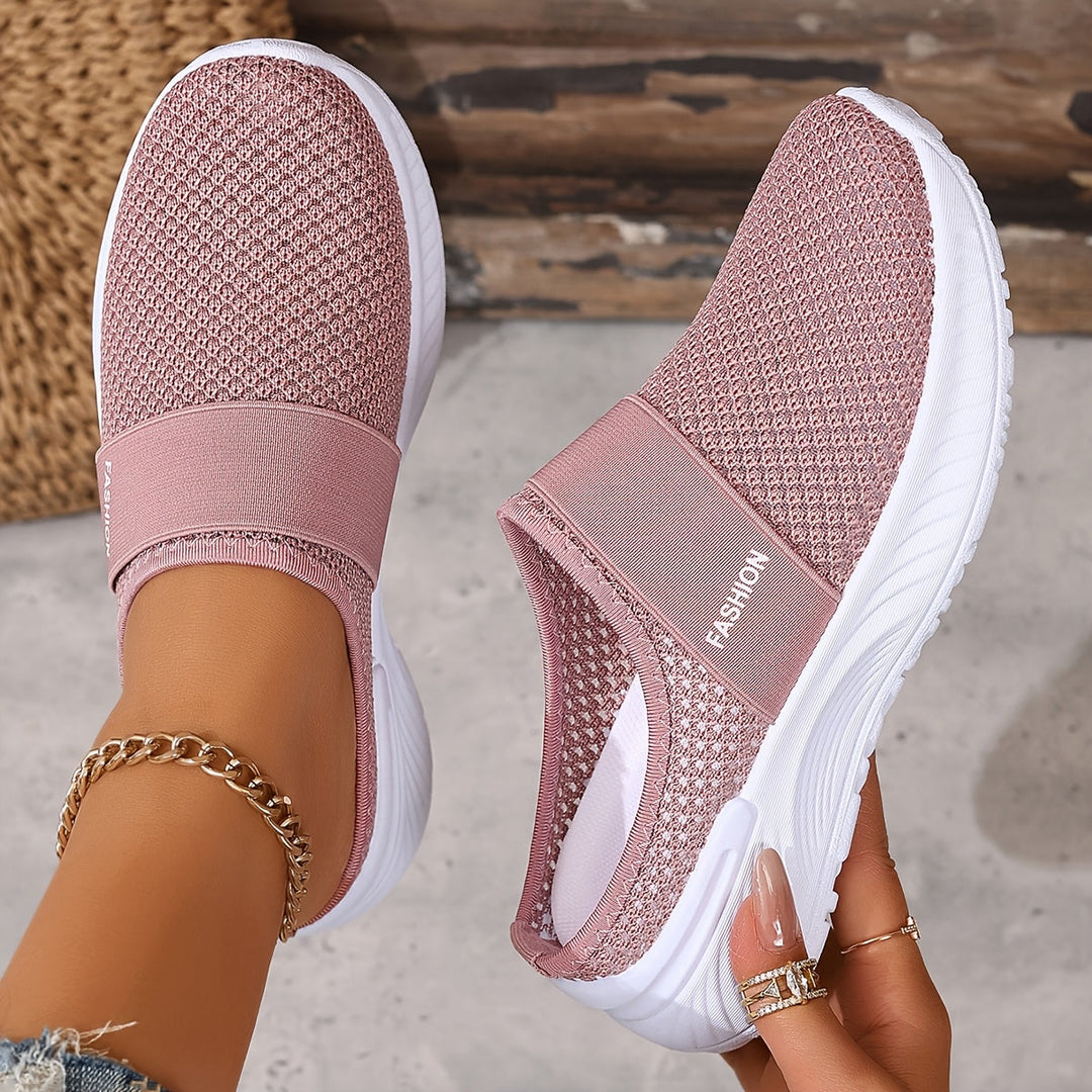 Stylish women's summer slip-on sneakers with breathable mesh, perfect for walking.