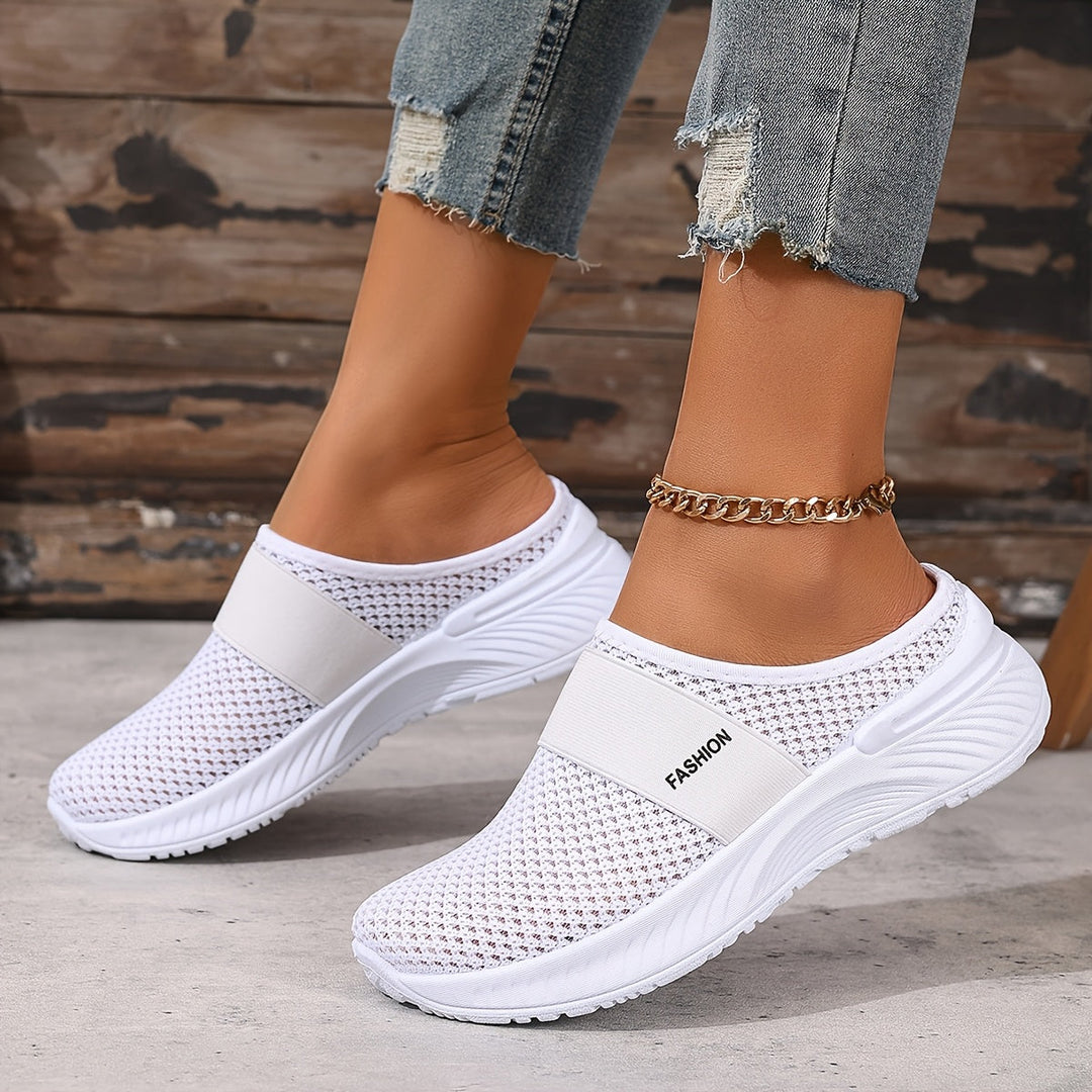 Comfortable women's slip-on summer sneakers featuring a stylish breathable mesh upper.