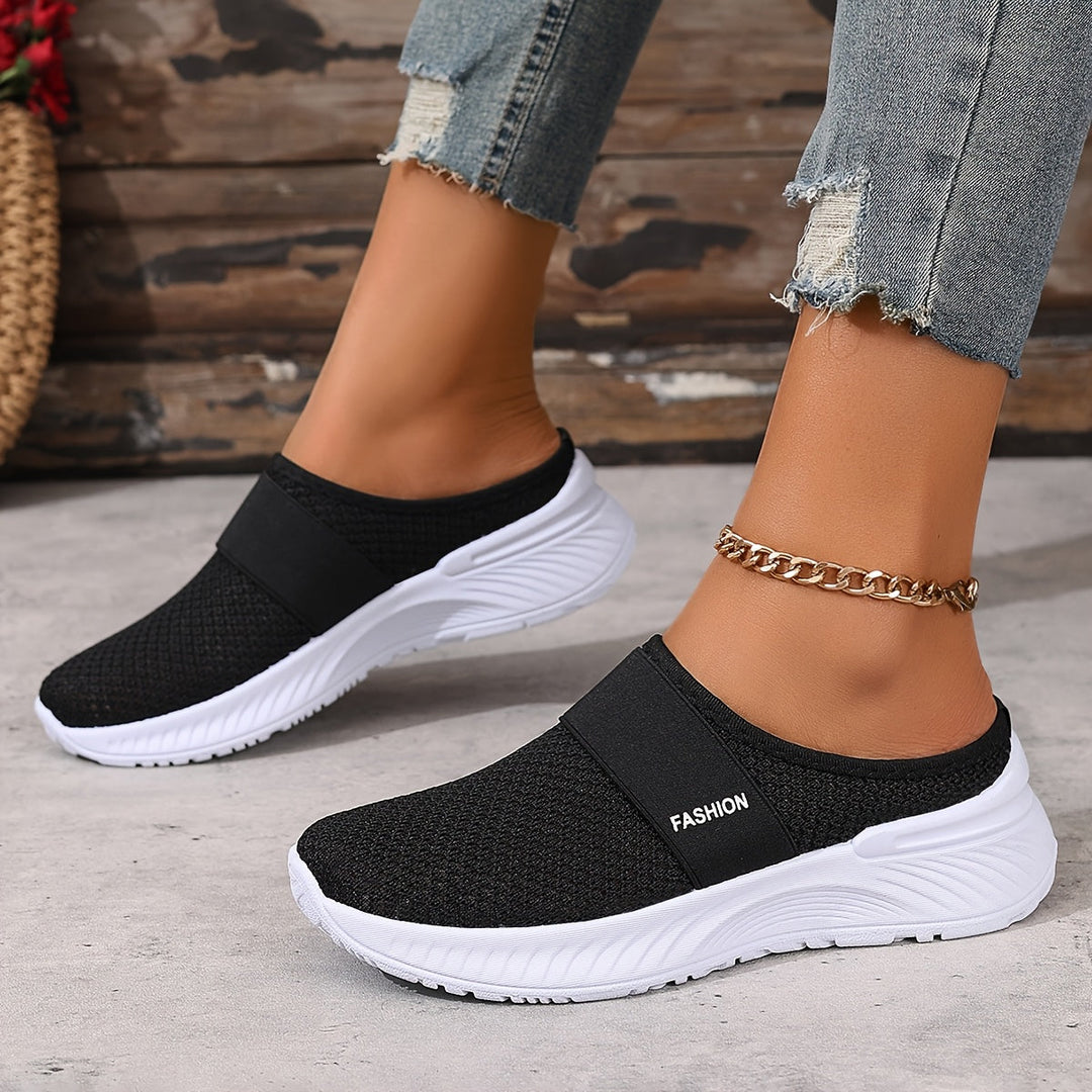 Fashionable women's breathable mesh slip-on sneakers, ideal for summer travel.