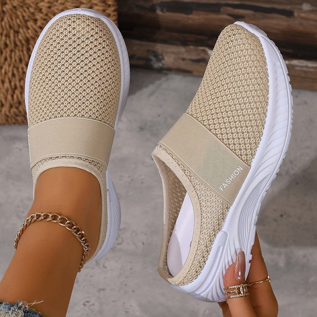 Women's lightweight slip-on summer sneakers with breathable mesh for everyday wear.