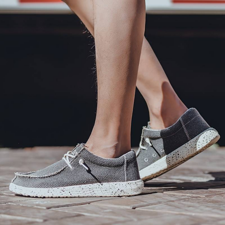 Ergonomic women's slip-on shoes with supportive footbed. Breathable & comfortable walking flats.