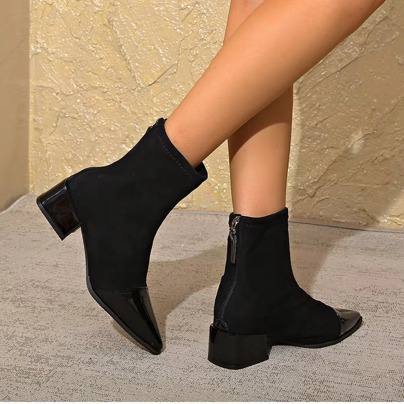 High-angle view of women's brown block heel ankle boots, showcasing full design.