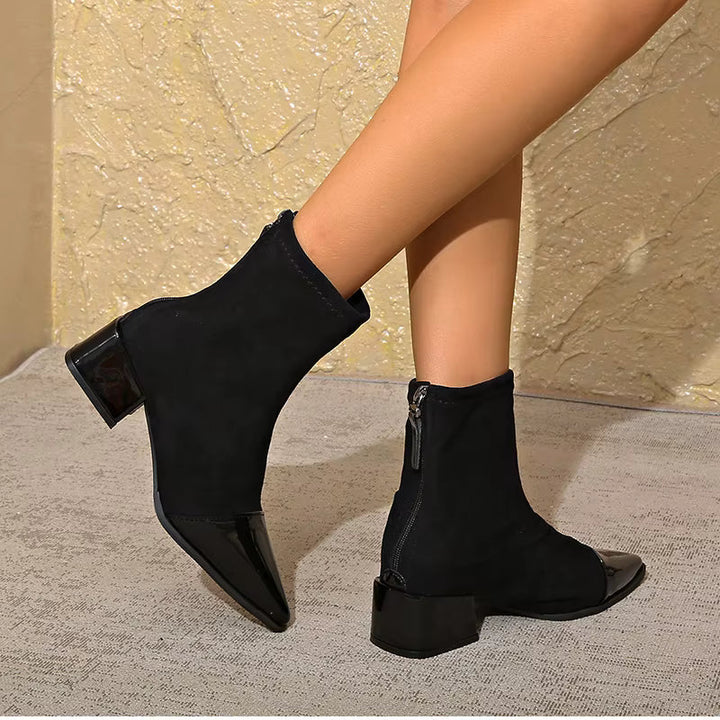 High-angle view of women's brown block heel ankle boots, showcasing full design.