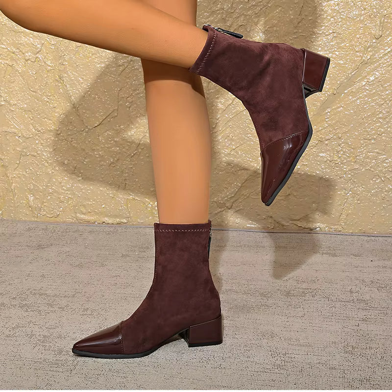 Women's block heel ankle boots in a product spotlight, emphasizing quality and style for winter.