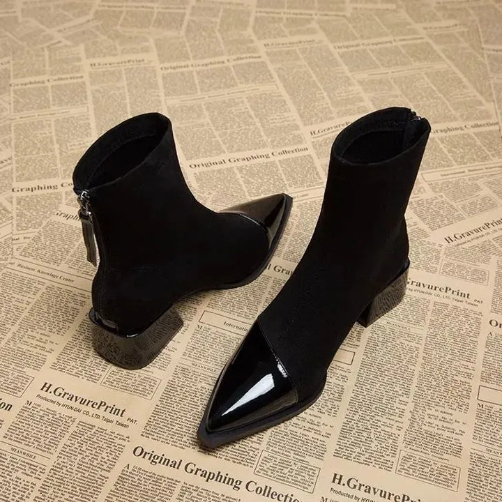 Front view of black women's block heel ankle boots, a comfortable footwear choice.