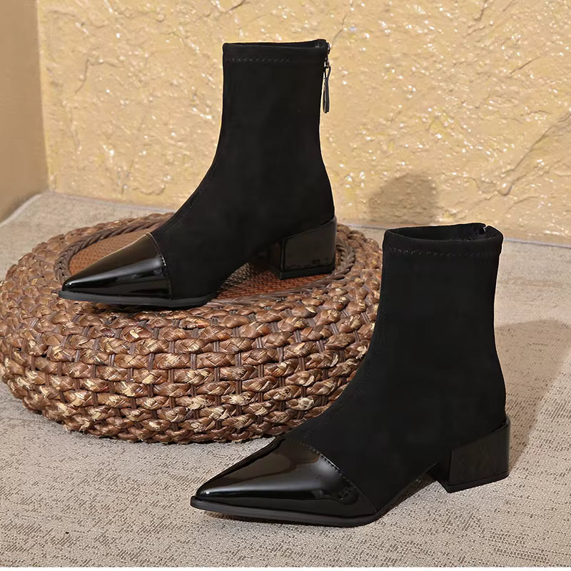 Women's block heel ankle boots in a cozy winter setting, ultimate comfort and style.