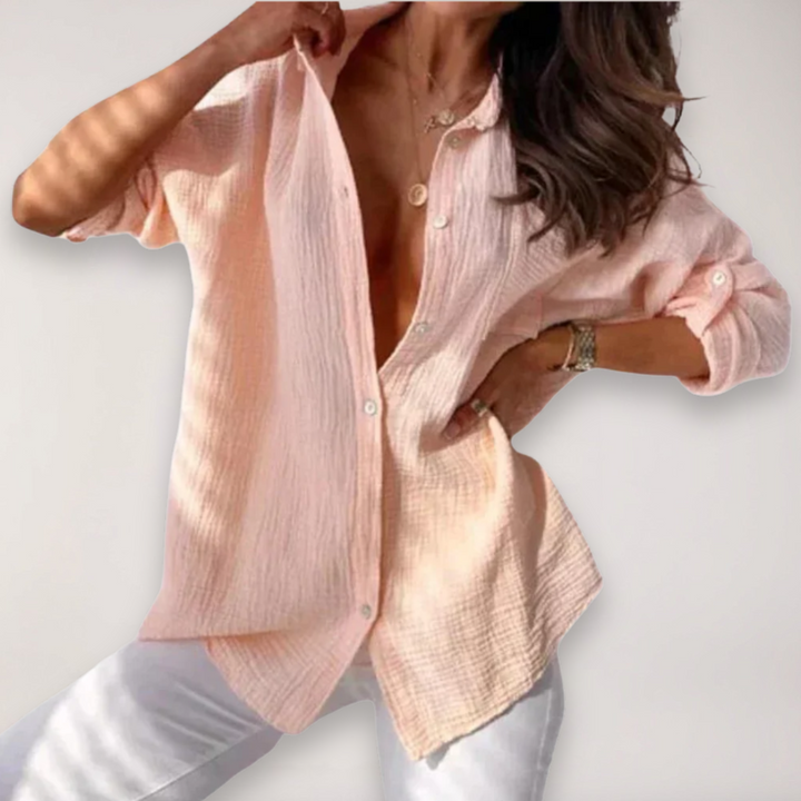 Women's button front shirt with roll-up sleeves in white, perfect for casual summer wear.