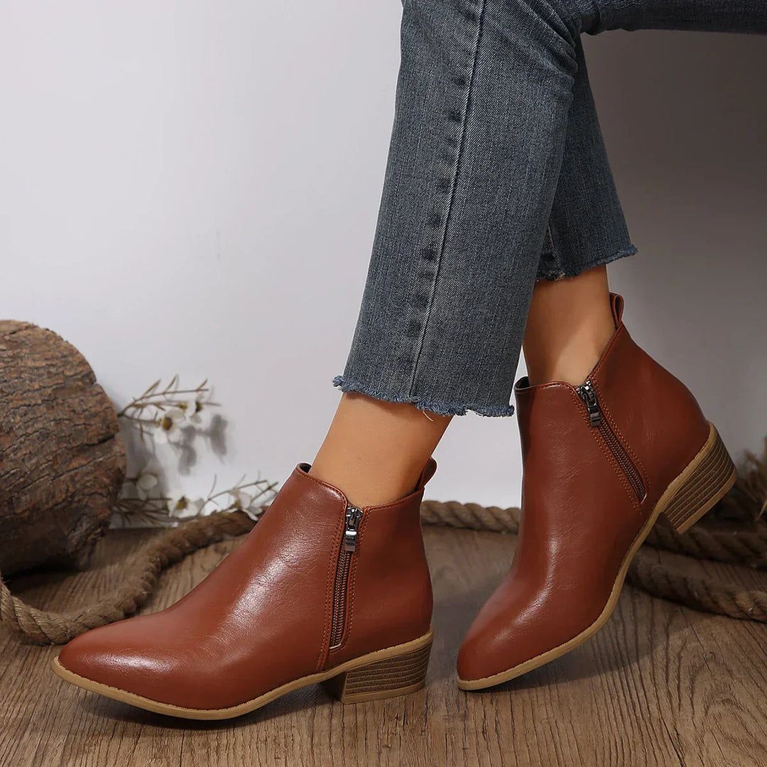 Women's ankle boots in a neutral color with side zip, great for comfortable spring and daily wear.