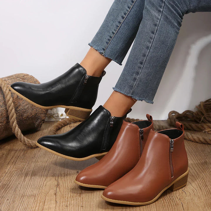 Fashionable women's ankle boots with side zipper, showcasing their versatility and everyday comfort.