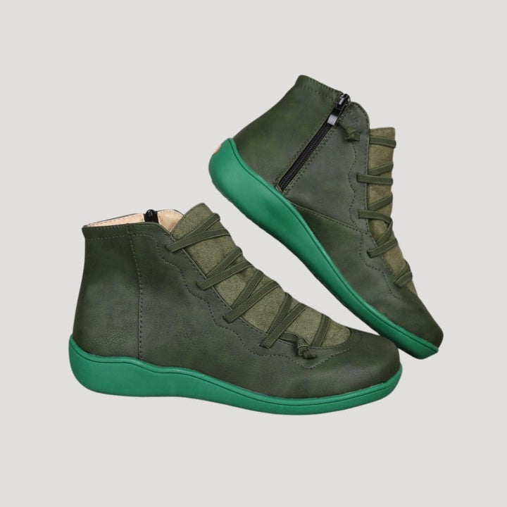 Close-up of a women's casual ankle boot with a decorative strap, perfect for spring outfits.