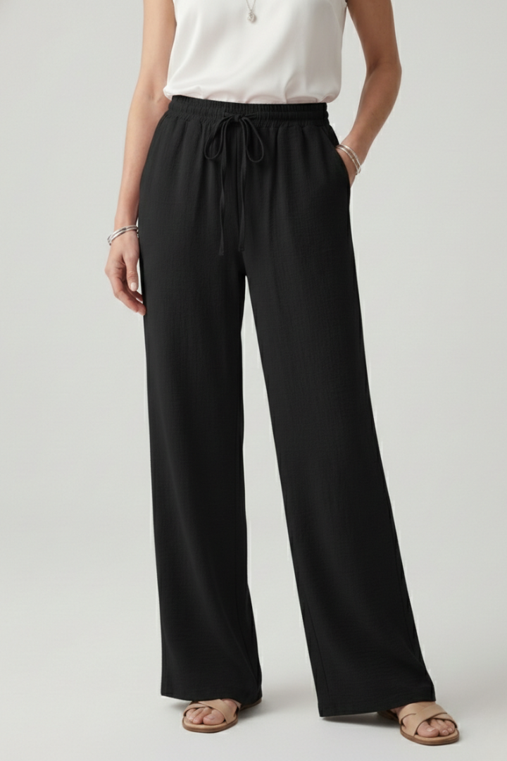 Versatile women's casual wear: wide-leg palazzo trousers with a comfortable drawstring waistband.