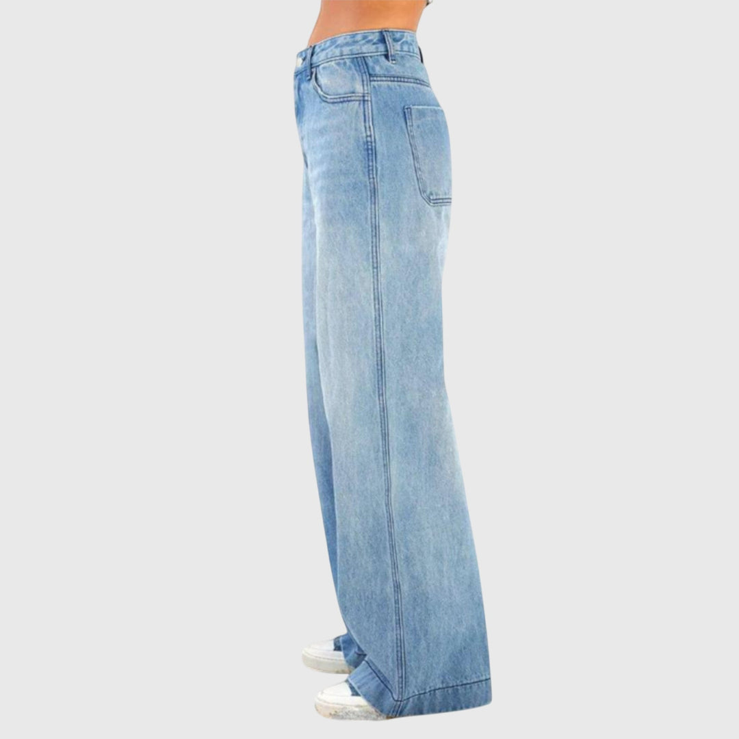 High-rise women's baggy denim pants in blue, designed for comfortable and fashionable casual outfits