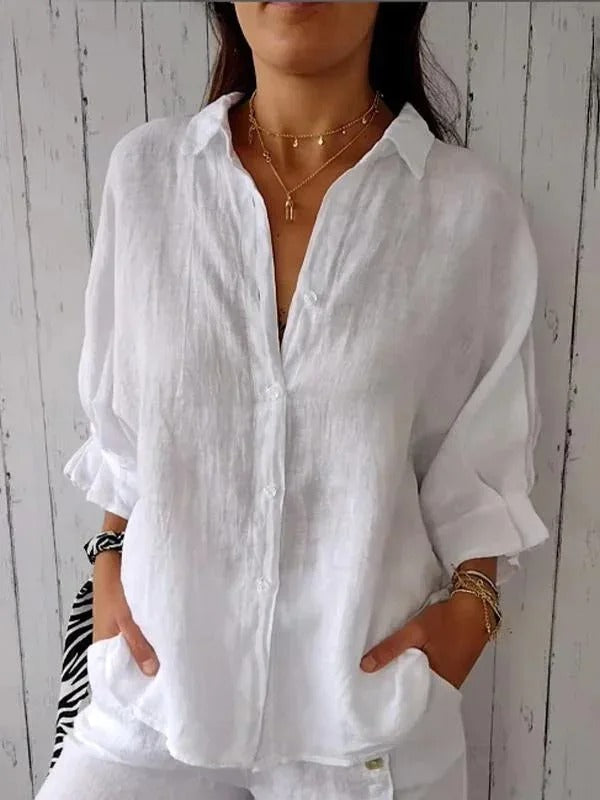 Stylish women's button-up blouse, perfect for casual outings or office wear.