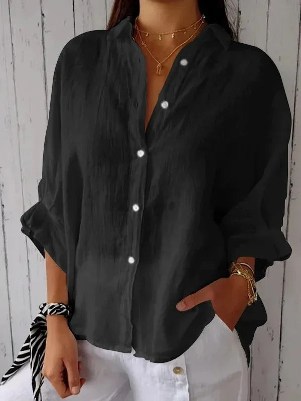 Comfortable women's button-up shirt in a relaxed fit, ideal for casual wear.