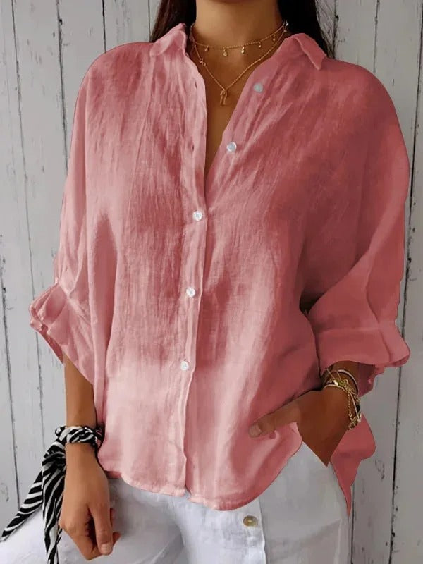 Classic women's button-up blouse, a stylish and versatile casual top for ladies.