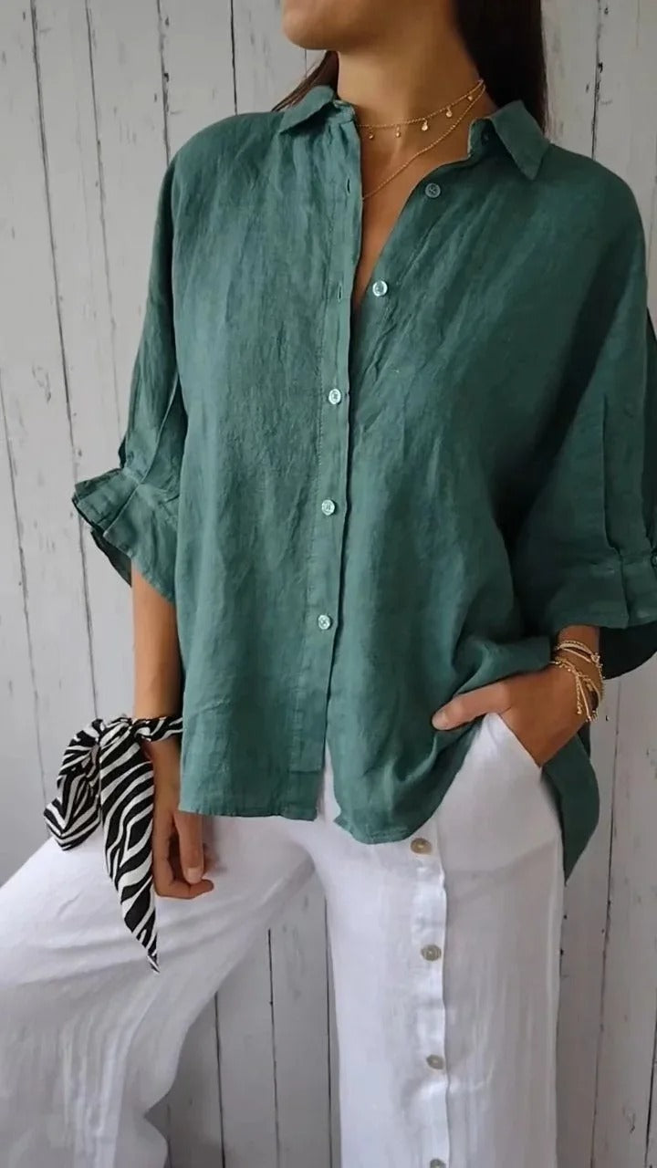 Front view of a women's button-up shirt, showing its casual elegance and comfort.