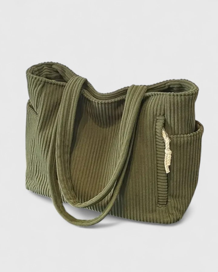 Women's casual shoulder bag styled with everyday outfit, demonstrating its practical size