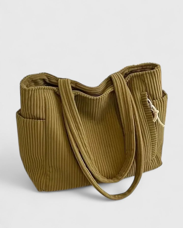 Compact women's casual shoulder bag with organized interior for essentials, versatile crossbody style