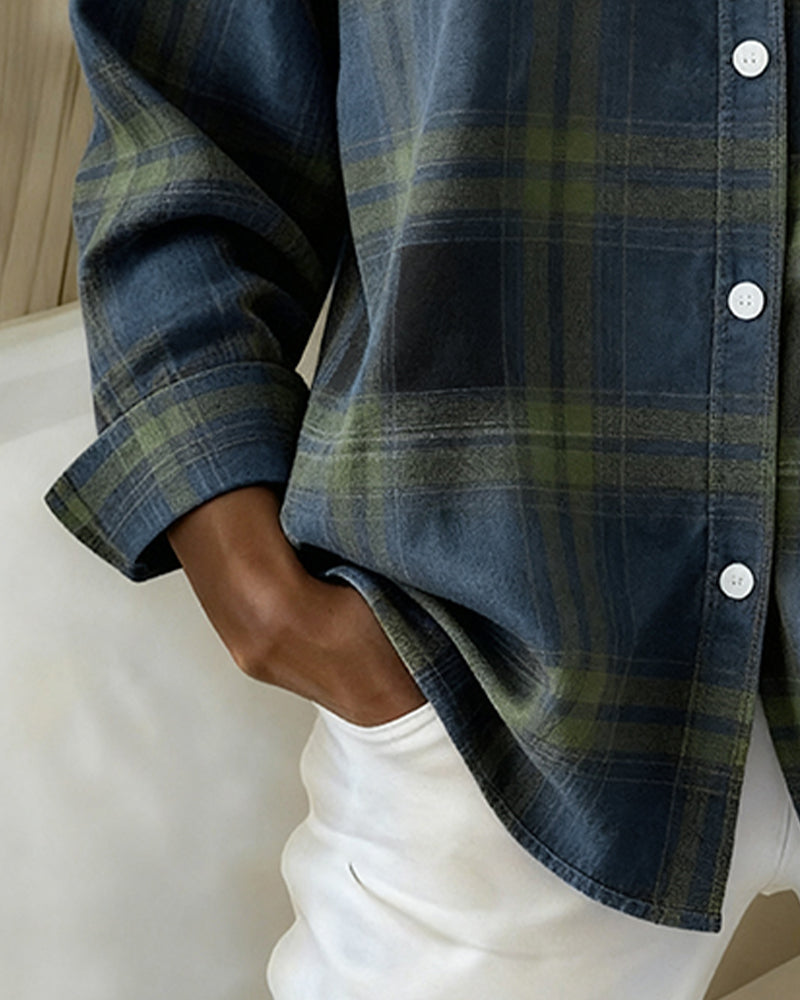 Fashionable women's checked shirt with long sleeves & notched lapel, smart collared blouse for autumn style.