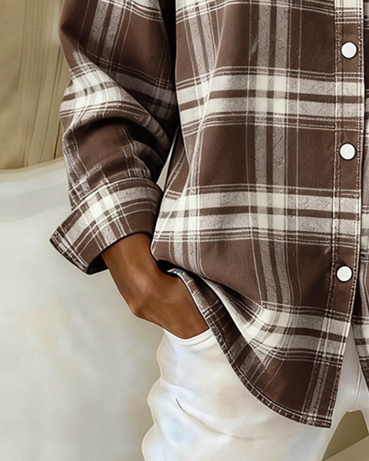 Women's long sleeve checked shirt featuring a stylish notched lapel, a versatile casual fashion top for autumn.