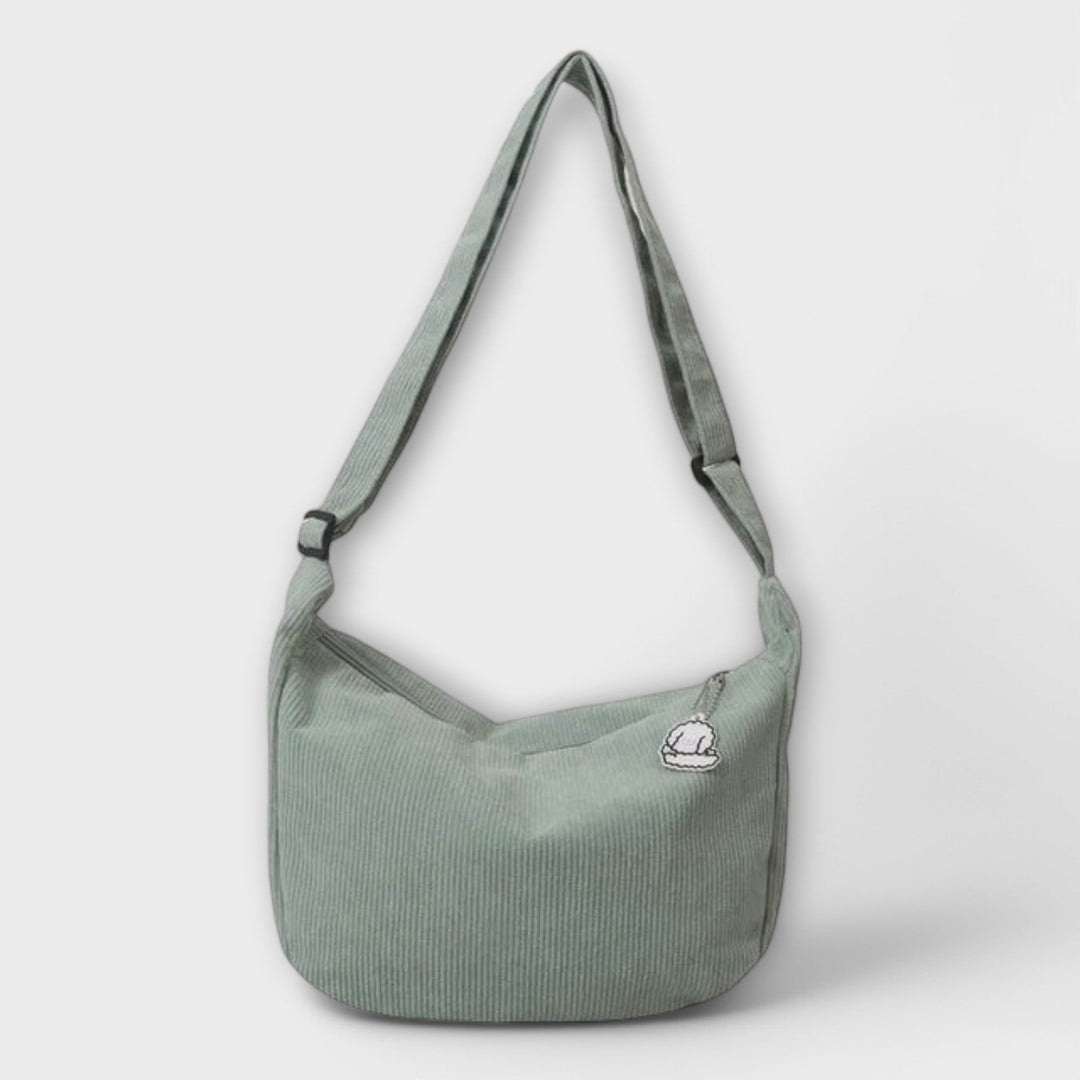Vintage-inspired casual corduroy hobo bag for women, a fashionable and functional shoulder bag.