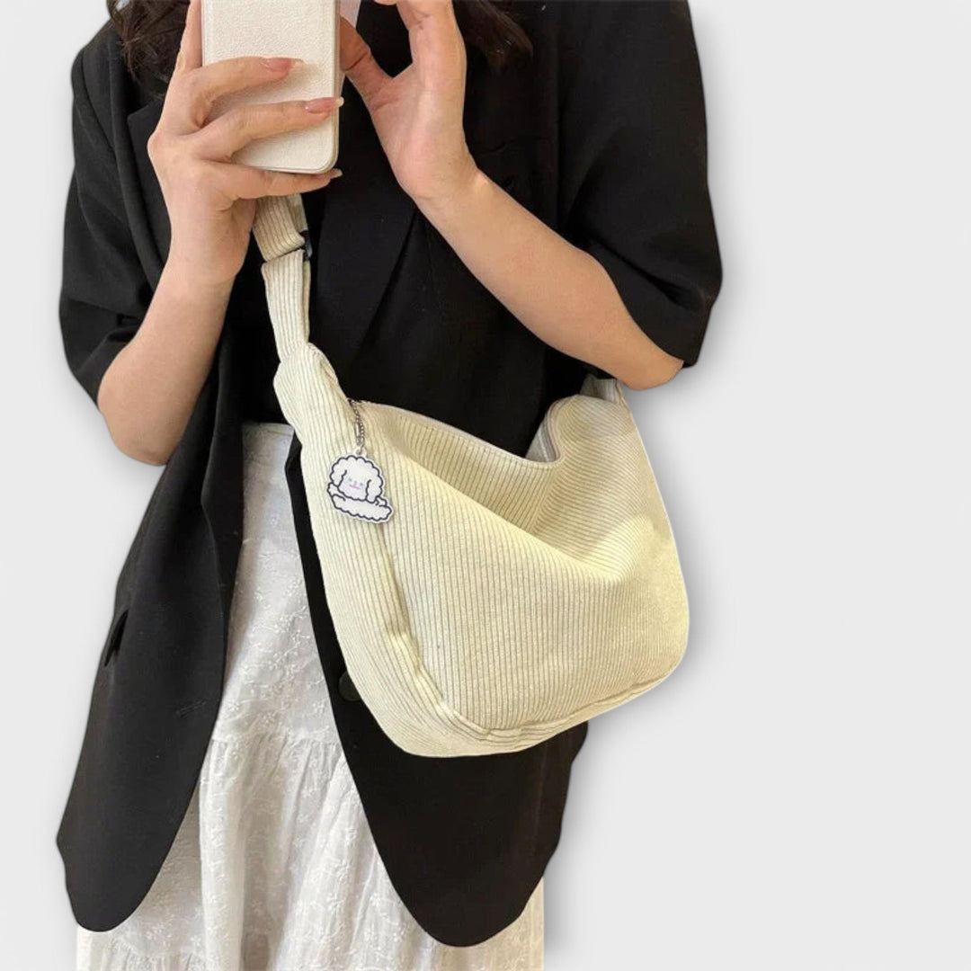 Everyday women's hobo bag made from soft corduroy fabric, designed for casual wear.