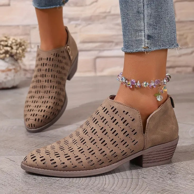 Comfortable women's ankle boots with cutout details, perfect for casual spring outfits
