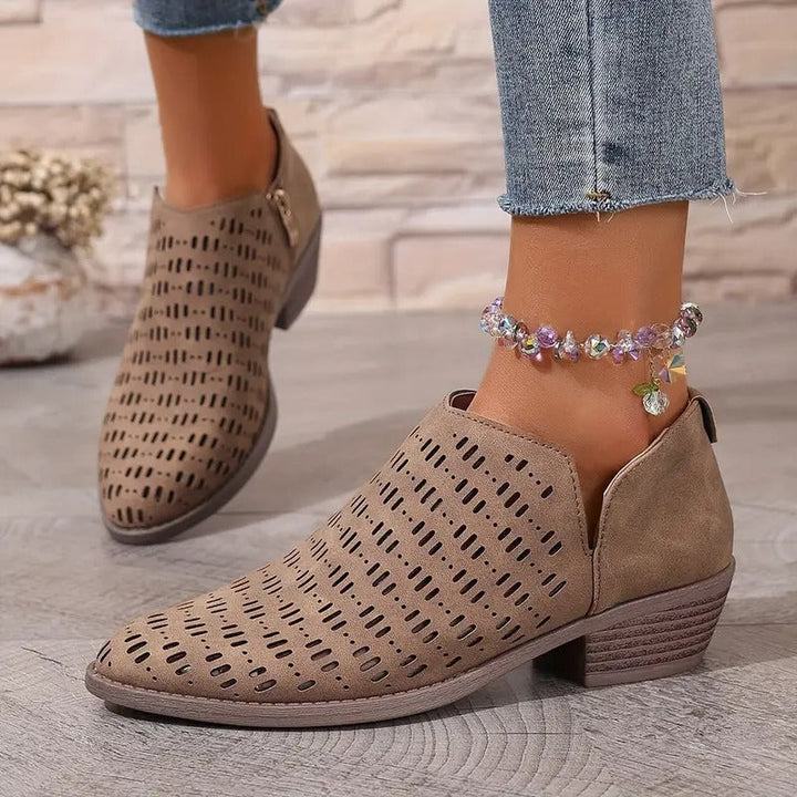 Comfortable women's ankle boots with cutout details, perfect for casual spring outfits