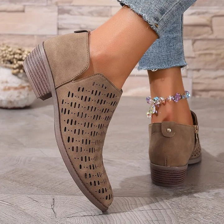 Stylish women's casual ankle boots with unique cutout design, versatile for any season