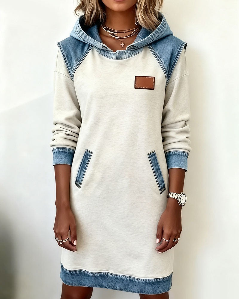 Close-up of the denim fabric on a women's casual hoodie dress, quality texture