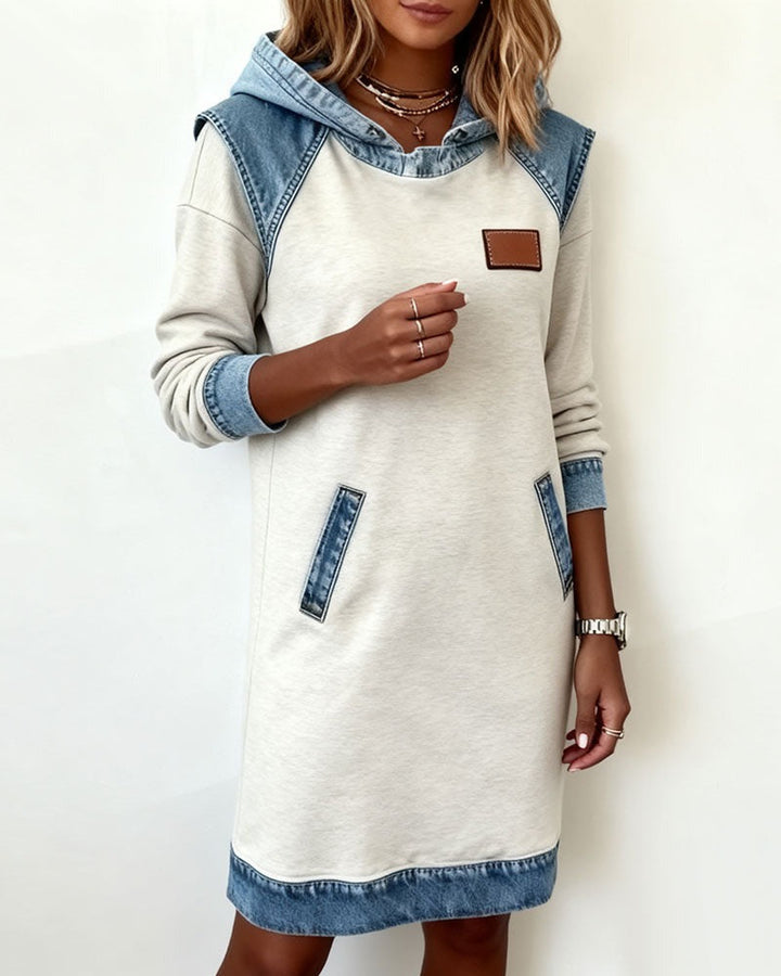 Back view of a women's denim hooded midi dress, comfortable and stylish for everyday