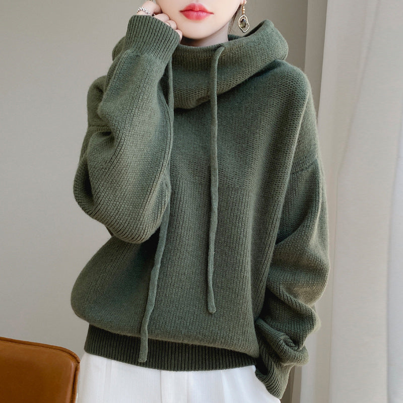 Women's casual drawstring hoodie in light pink, relaxed fit for spring/summer comfort