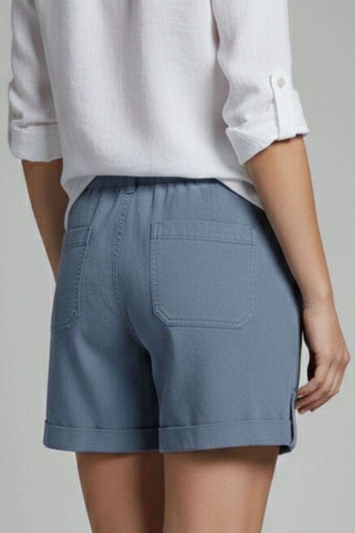 Back view of women's loose-fit summer shorts, ideal for relaxed everyday fashion.