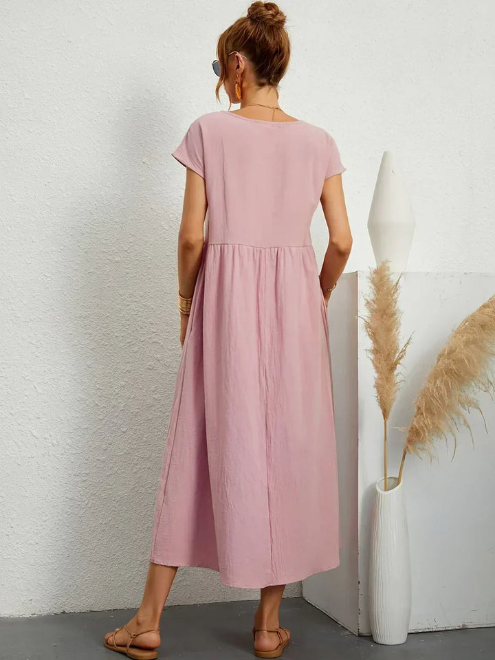 Women's comfortable flowy midi dress, a versatile everyday essential.