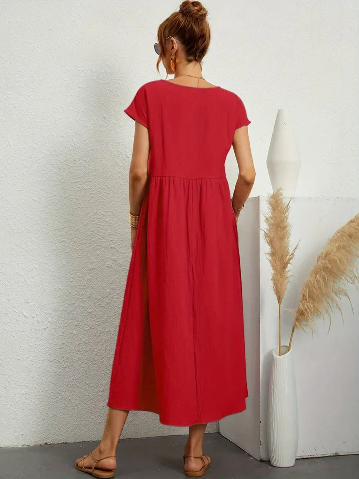 Chic flowy women's dress, ideal for versatile summer fashion.